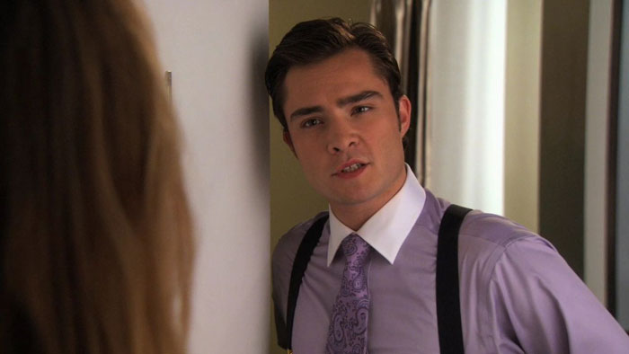 Chuck wearing purple shirt and tie 