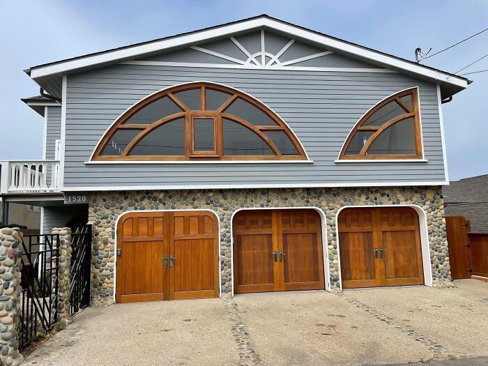 Client: I’d Like A Quarter Circle Window Over Each Garage Door. Architect: Say No More…