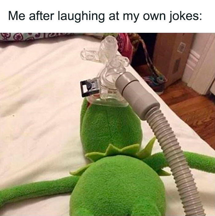 Kermit the Frog on a respirator, humorously captioned "Me after laughing at my own jokes."