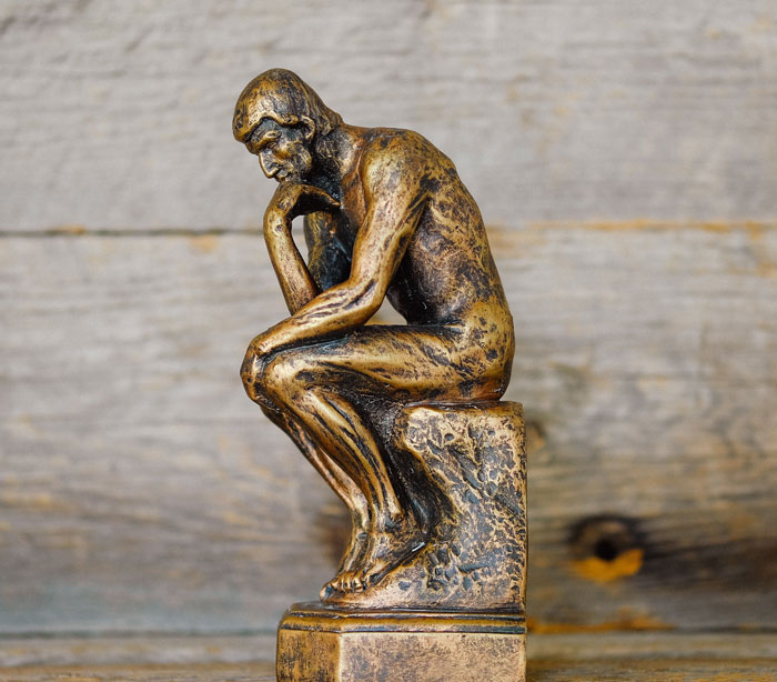 Person thinking statue 
