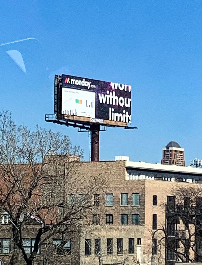 This Is A Tarp Billboard That A Team Of Workers Probably Spent An Hour Or Two Putting Up, Only To Notice The Mistake And Say: "Screw It"