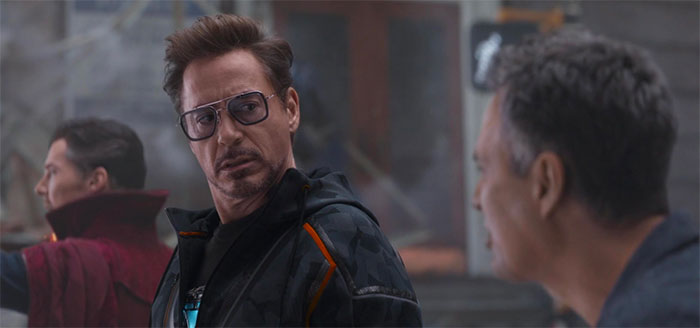 Tony Stark is talking with a man