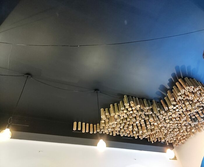 Local Ramen/Sushi Spot. They're Glueing Bamboo On The Ceiling Edit (Additional Info): Yes, They Glued It One By One. We Don't Have Many Venomous Spiders/Insects In General In Here So That's That I Guess? They Also Have Paper Cranes Hanging From The Ceiling In The Other Part Of The Restaurant. Their Food Is Amazing But This Decor