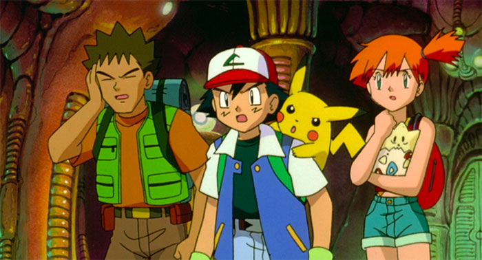 Ash Ketchum with Pikachu on his back, Brock and Misty