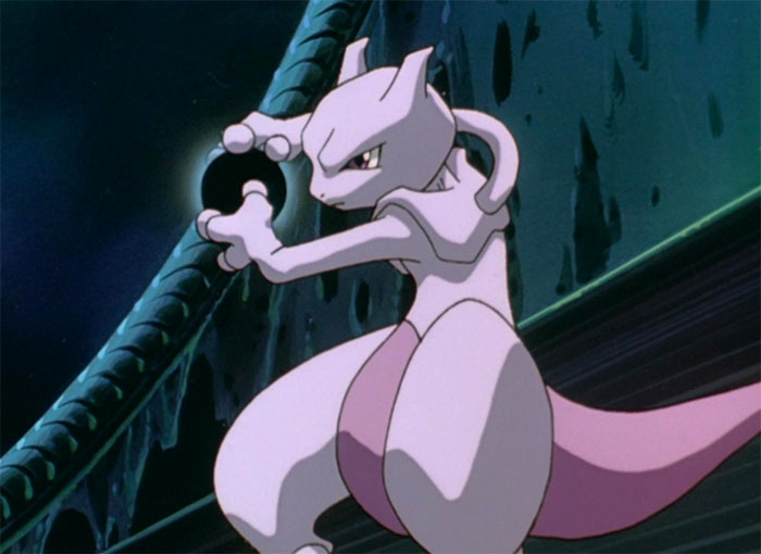 Mewtwo standing and holding the black ball