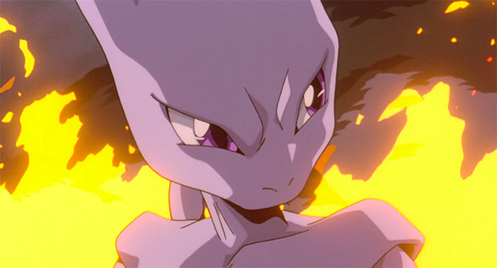 Mewtwo looks strict and a yellow fire in the background