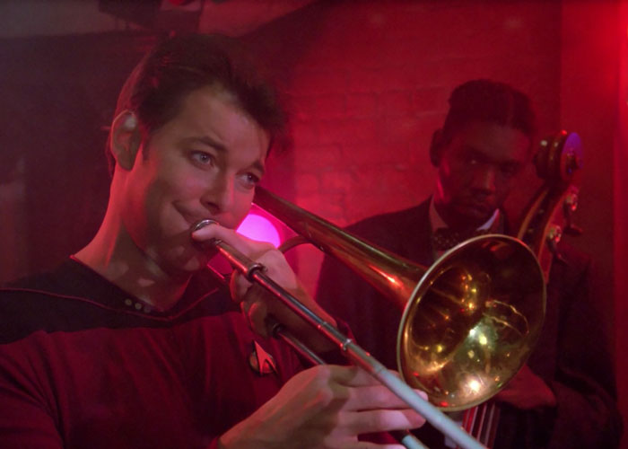 William T. Riker playing an instrument