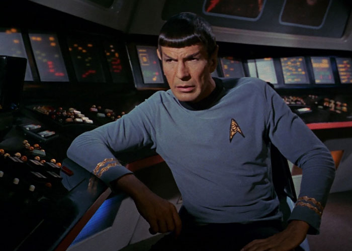 Spock looking very concerned at the control panel