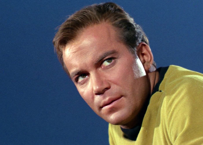 Captain James T. Kirk looking at something