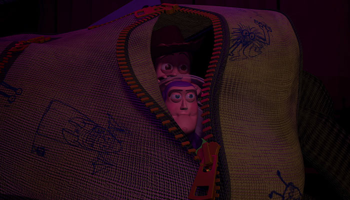 Buzz lightyear and woody hiding in a bag