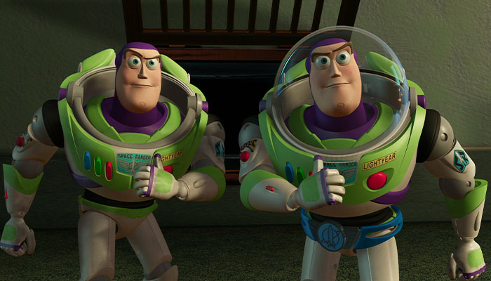 Fake buzz and real buzz pointing at themselves