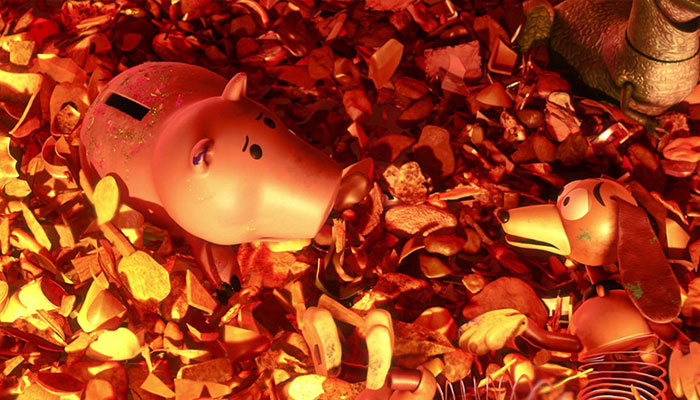 Hamm and Slinky Dog nearing a fire pit