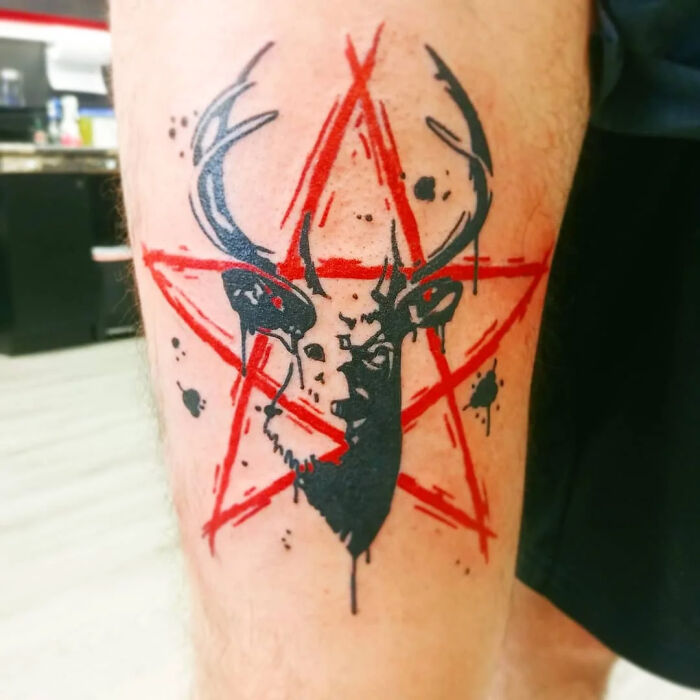 Calf tattoo with deer and star