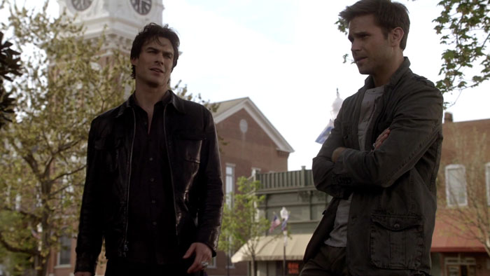 Damon and Alaric talking on the street 