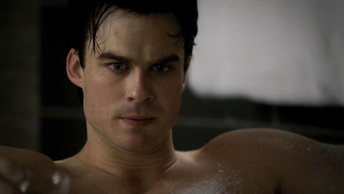Damon taking a bath 