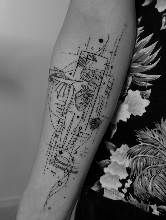 Geometric tattoo on forearm featuring intricate designs and shapes, showcasing a unique style by a talented tattoo artist. Geometric tattoo on forearm featuring intricate designs and shapes, showcasing a unique style by a talented tattoo artist.