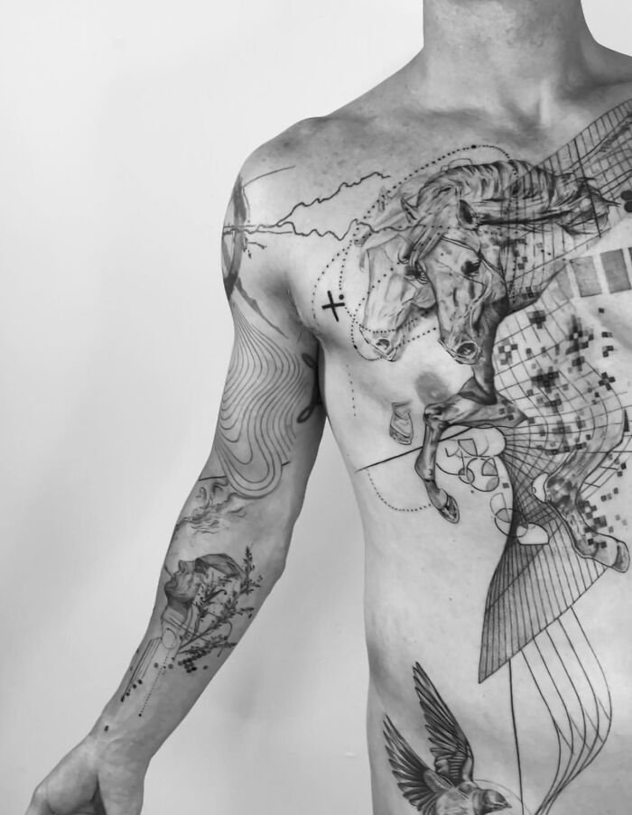 Man with intricate geometric tattoo sleeve and chest design, showcasing a talented tattoo artist's work. Man with intricate geometric tattoo sleeve and chest design, showcasing a talented tattoo artist's work.