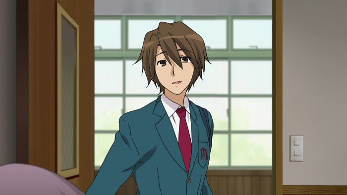 Koizumi Itsuki looking and smiling from The Melancholy of Haruhi Suzumiya