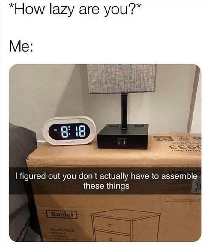 Meme from Men’s Humor showing unassembled furniture box used as a table with a lamp and clock on top.