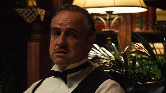 Don Vito Corleone looking to the side 
