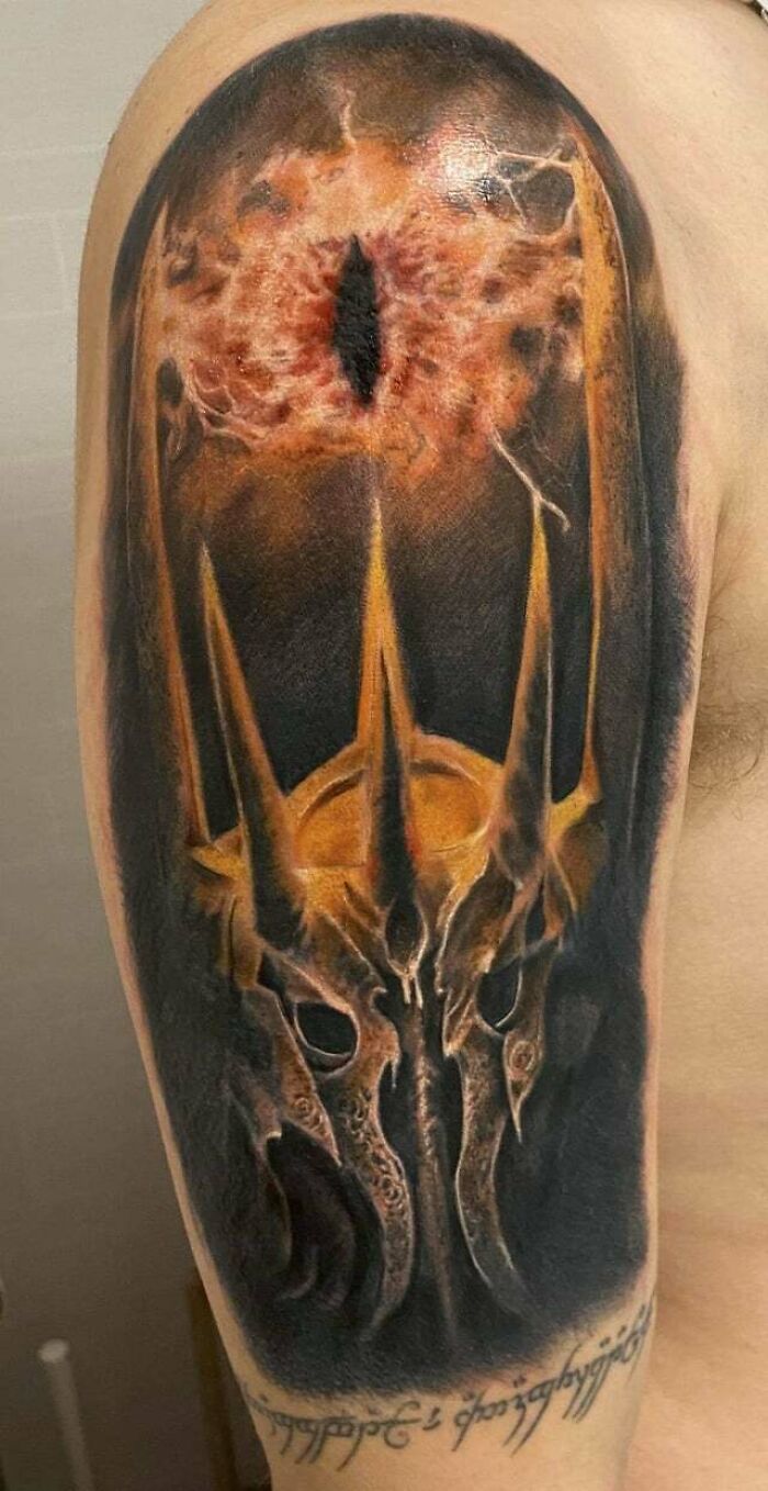 Sauron's eye and helmet tattoo 