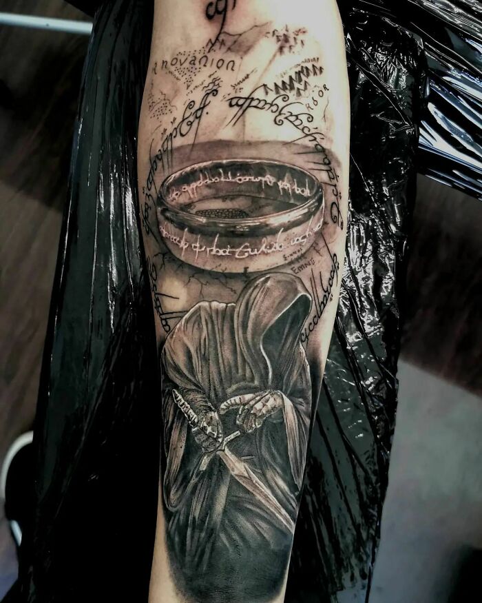 One ring arm tattoo 