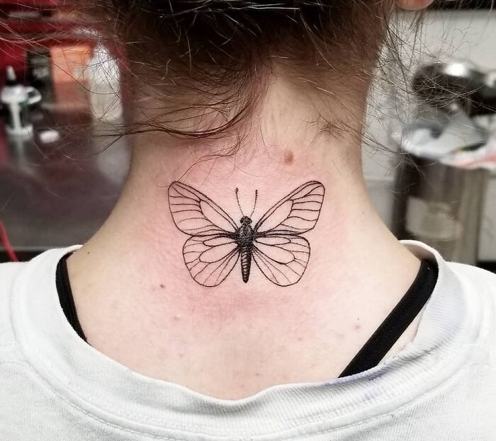 butterfly back neck tattoo