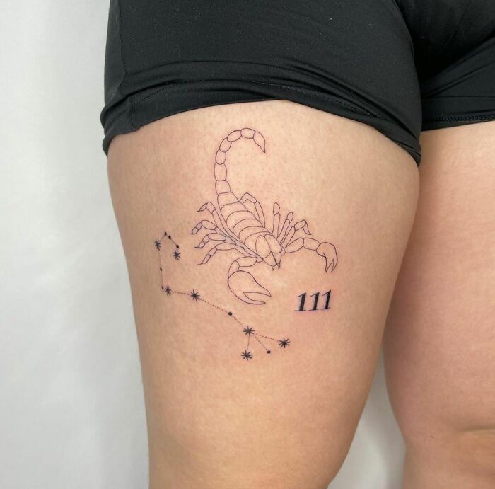 Scorpio and constellation thigh tattoo