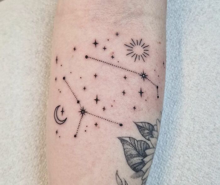 Aries and Cancer constellations tattoo