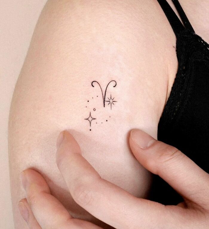 Tiny Aries shoulder tattoo