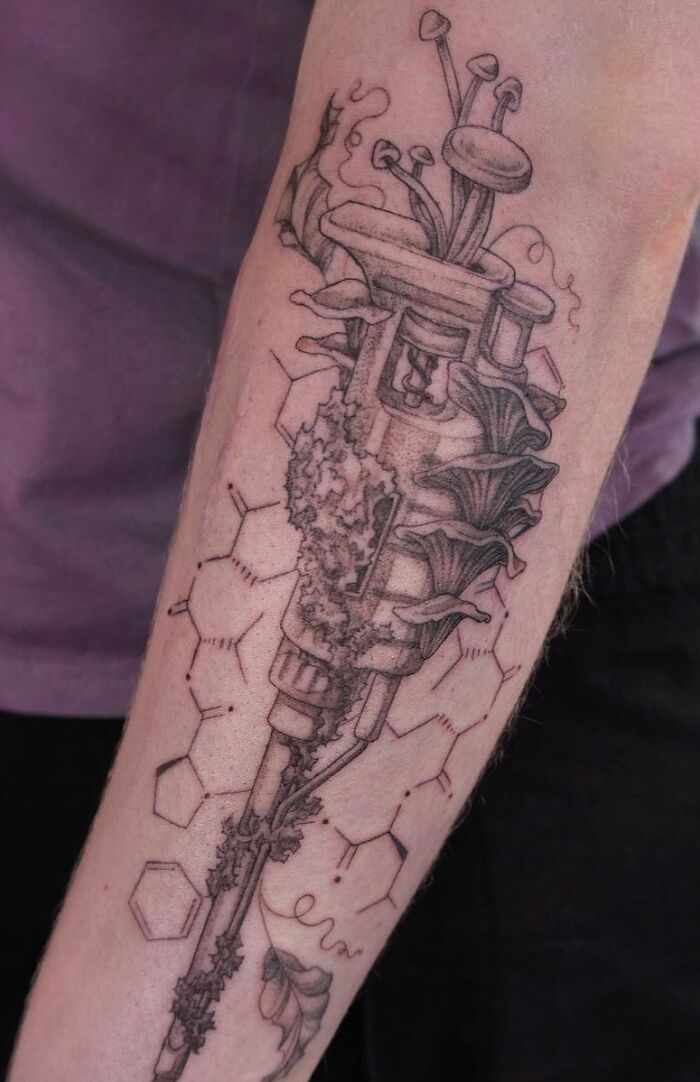 Mossy micropipette arm tattoo