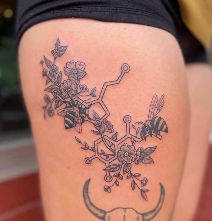 Bees, Flowers and good feelings tattoo on leg