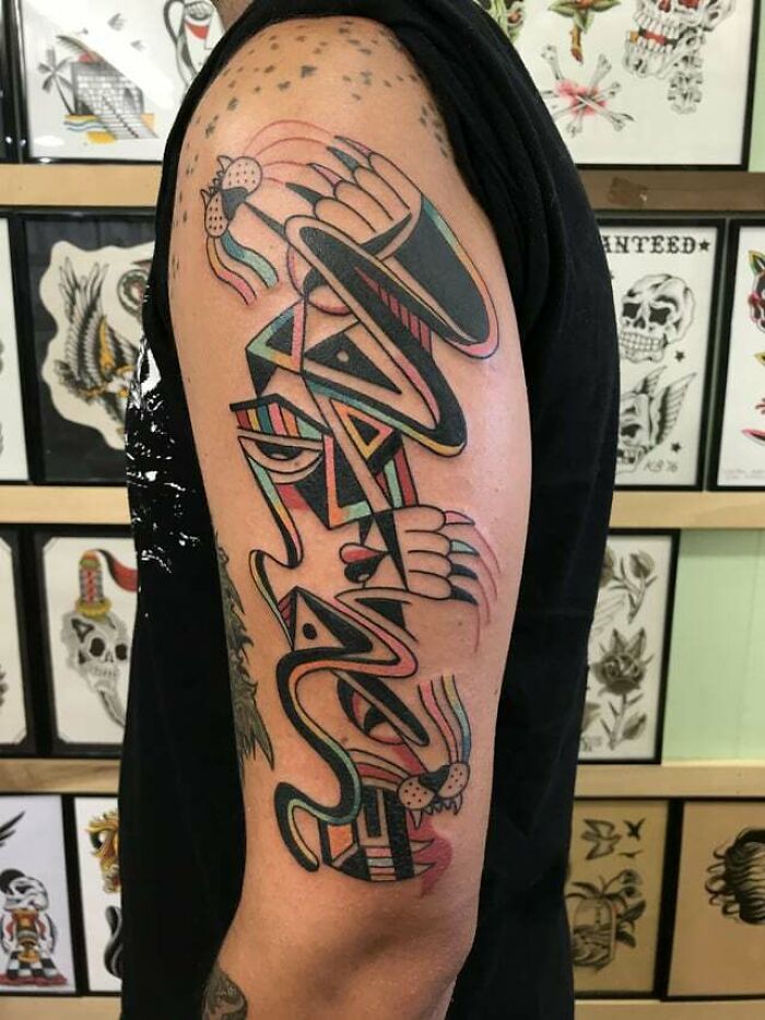 Abstract and colorful Panther arm Tattoo