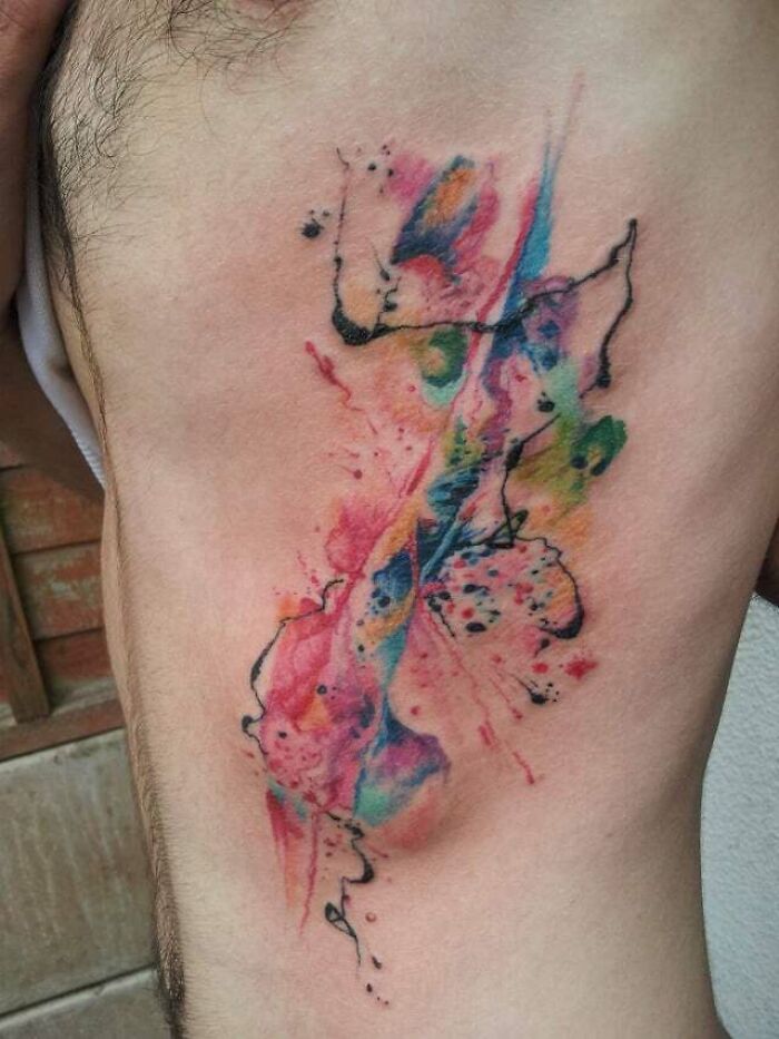  Abstract and colorful Tattoo On The Ribs