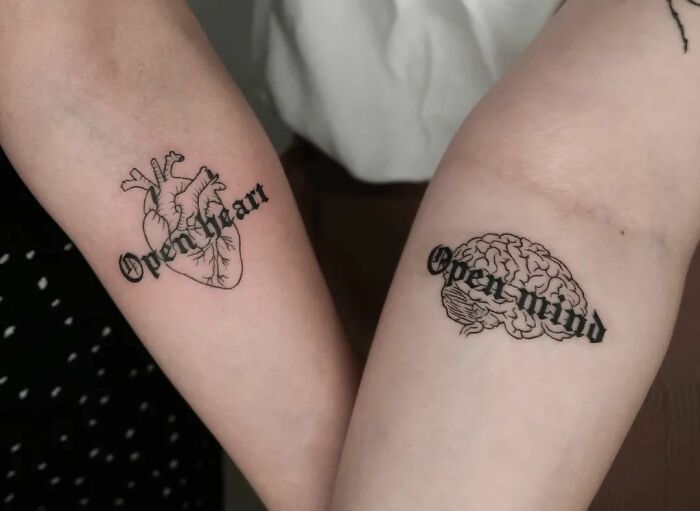 "Open Heart" and "Open mind" phrases with heart and brain tattoo 