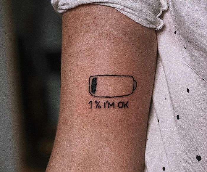 Battery with 1% arm tattoo 