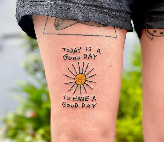 Sunshine thigh tattoo