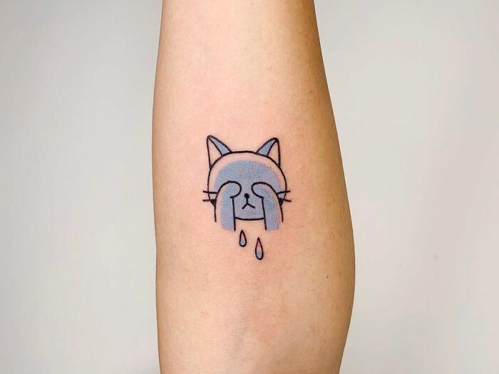 Crying kitten tattoo 