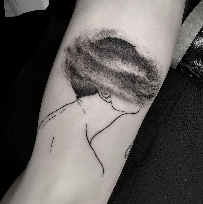 Head in the cloud arm tattoo 