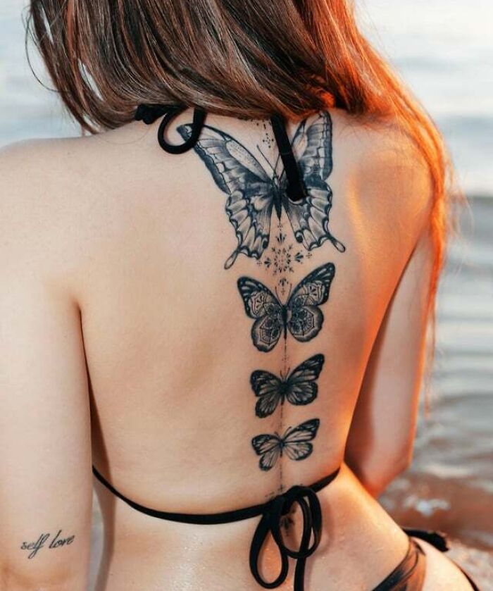 abstract A Series Of Butterflies back spine Tattoos