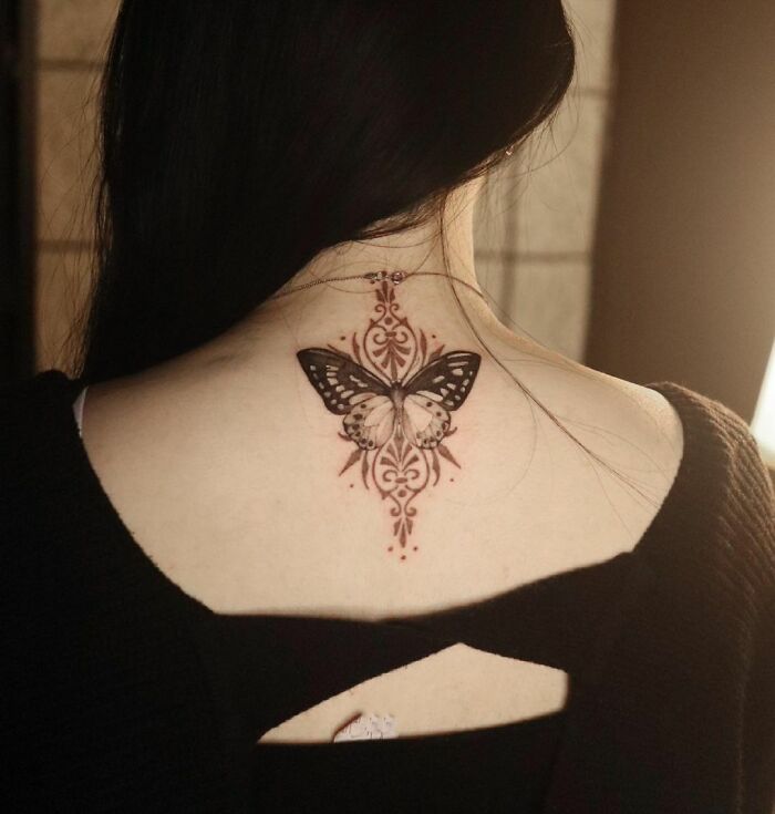 geometrical Butterfly back neck Tattoo