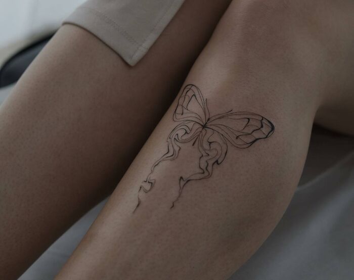 abstract Butterfly On The Leg Tattoo