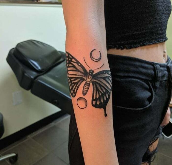 Blackwork Butterfly with moon and sun arm Tattoo