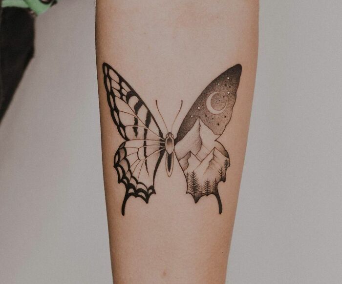 Mountain And Night Butterfly arm Tattoo