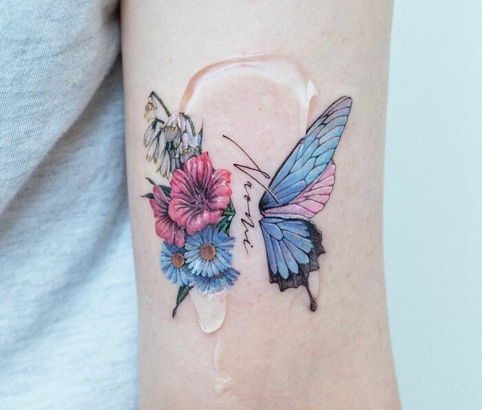 Flower and Butterfly arm Tattoo