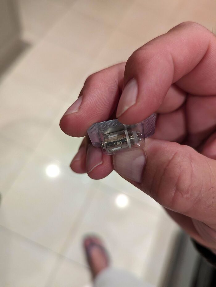 Found This While Vacuuming, It's About 2 Cm Long Has Inscription On It "8-20w 1.5". Had Very Small Thread To The Right Had Side, With What Looks Like A Hole Right Through It. Made Of Steel, Sealed In Packaging Shown. Any Ideas What It Might Be?