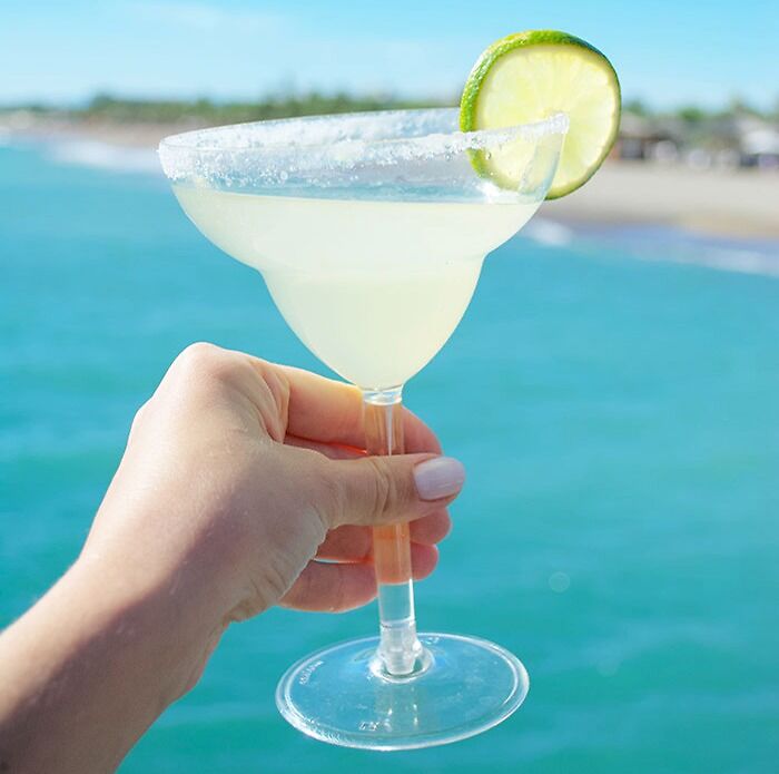 Glass of Margarita coctail with lime