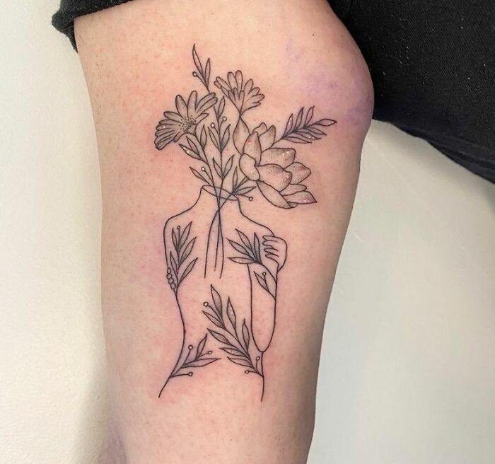Floral Women arm tattoo 