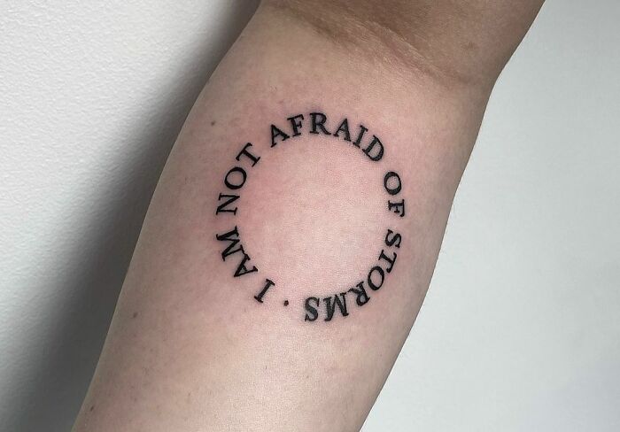 'I Am Not Afraid Of Storms' Phrase Tattoo