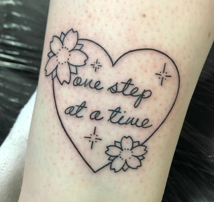 'One Step At A Time' Phrase In A Heart Tattoo